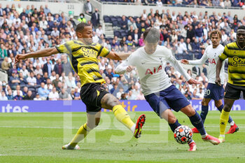 2021-08-29 - Heung-Min Son (7) of Tottenham Hotspur evades the tackle from William Troost-Ekong (5) of Watford during the English championship Premier League football match between Tottenham Hotspur and Watford on August 29, 2021 at Tottenham Hotspur Stadium in London, England - Photo Nigel Keene / ProSportsImages / DPPI - TOTTENHAM HOTSPUR VS WATFORD - ENGLISH PREMIER LEAGUE - SOCCER