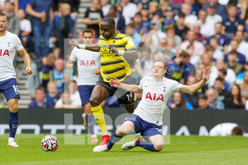 2021-08-29 - Oliver Skipp (29) of Tottenham Hotspur tackled by Moussa Sissoko (19) of Watford during the English championship Premier League football match between Tottenham Hotspur and Watford on August 29, 2021 at Tottenham Hotspur Stadium in London, England - Photo Nigel Keene / ProSportsImages / DPPI - TOTTENHAM HOTSPUR VS WATFORD - ENGLISH PREMIER LEAGUE - SOCCER