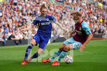 2021-08-29 - Leeds United defender Luke Ayling and Charlie Taylor of Burnley during the English championship Premier League football match between Burnley and Leeds United on August 29, 2021 at Turf Moor in Burnley, England - Photo Malcolm Bryce / ProSportsImages / DPPI - BURNLEY VS LEEDS UNITED - ENGLISH PREMIER LEAGUE - SOCCER