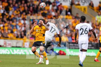 2021-09-18 - Ruben Neves (8) of Wolverhampton Wanderers claims a foul by Ivan Toney (17) of Brentford during the Premier League match between Wolverhampton Wanderers and Brentford at Molineux, Wolverhampton, England on 18 September 2021. Photo Nigel Keene / ProSportsImages / DPPI - WOLVERHAMPTON WANDERERS VS BRENTFORD - ENGLISH PREMIER LEAGUE - SOCCER