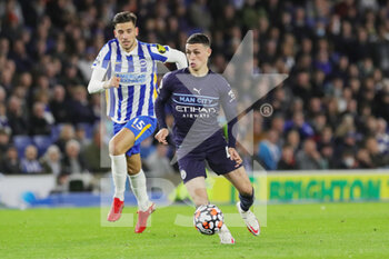 2021-10-24 - Manchester City midfielder Phil Foden (47) and Brighton and Hove Albion midfielder Jakub Moder (15) during the English championship Premier League football match between Brighton and Hove Albion and Manchester City on October 23, 2021 at the American Express Community Stadium in Brighton and Hove, England - BRIGHTON AND HOVE ALBION VS MANCHESTER CITY - ENGLISH PREMIER LEAGUE - SOCCER