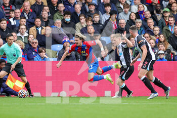 2021-10-23 - Conor Gallagher (23) of Crystal Palace is brought down by Matt Ritchie (11) of Newcastle United during the English championship Premier League football match between Crystal Palace and Newcastle United on October 23, 2021 at Selhurst Park in London, England - CRYSTAL PALACE VS NEWCASTLE UNITED - ENGLISH PREMIER LEAGUE - SOCCER