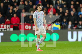 2021-11-21 - Manchester United defender Harry Maguire (5) walks after being sent off with red card during the English championship Premier League football match between Watford and Manchester United on November 20, 2021 at Vicarage Road in Watford, England - WATFORD VS MANCHESTER UNITED - ENGLISH PREMIER LEAGUE - SOCCER