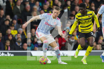 2021-11-21 - Manchester United Midfielder Scott McTominay (39) battles with Watford forward Ismaila Sarr (23) during the English championship Premier League football match between Watford and Manchester United on November 20, 2021 at Vicarage Road in Watford, England - WATFORD VS MANCHESTER UNITED - ENGLISH PREMIER LEAGUE - SOCCER