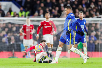 2021-11-29 - Manchester United Midfielder Bruno Fernandes (18) tackles Chelsea Defender Thiago Silva during the English championship Premier League football match between Chelsea and Manchester United on November 28, 2021 at Stamford Bridge in London, England - CHELSEA VS MANCHESTER UNITED - ENGLISH PREMIER LEAGUE - SOCCER