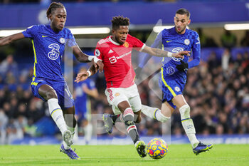 2021-11-29 - Manchester United Midfielder Fred (17) battles with Chelsea Midfielder Trevoh Chalobah and Chelsea Midfielder Hakim Ziyech during the English championship Premier League football match between Chelsea and Manchester United on November 28, 2021 at Stamford Bridge in London, England - CHELSEA VS MANCHESTER UNITED - ENGLISH PREMIER LEAGUE - SOCCER