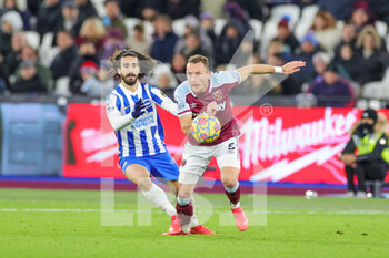 2021-12-01 - Vladimir Coufal (5) of West Ham United tussles with Marc Cucurella (3) of Brighton during the English championship Premier League football match between West Ham United and Brighton and Hove Albion on December 1, 2021 at the London Stadium in London, England - WEST HAM UNITED VS BRIGHTON AND HOVE ALBION - ENGLISH PREMIER LEAGUE - SOCCER
