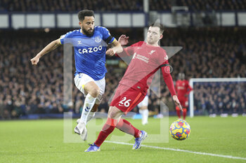2021-12-01 - Liverpool defender Andrew Robertson (26) tackles Everton midfielder Andros Townsend (14) during the English championship Premier League football match between Everton and Liverpool on December 1, 2021 at Goodison Park in Liverpool, England - EVERTON VS LIVERPOOL - ENGLISH PREMIER LEAGUE - SOCCER
