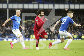 2021-12-01 - Liverpool forward Mohamed Salah (11) takes on Everton defender Lucas Digne (12) during the English championship Premier League football match between Everton and Liverpool on December 1, 2021 at Goodison Park in Liverpool, England - EVERTON VS LIVERPOOL - ENGLISH PREMIER LEAGUE - SOCCER