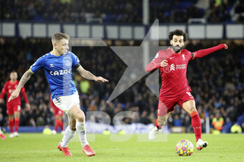 2021-12-01 - Liverpool forward Mohamed Salah (11) and Everton defender Lucas Digne (12) during the English championship Premier League football match between Everton and Liverpool on December 1, 2021 at Goodison Park in Liverpool, England - EVERTON VS LIVERPOOL - ENGLISH PREMIER LEAGUE - SOCCER