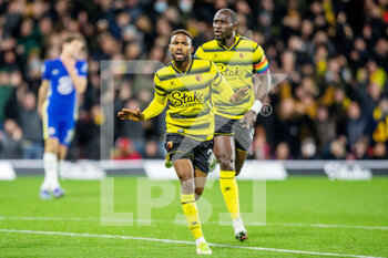 2021-12-01 - Watford forward Emmanuel Dennis (25) celebrates his goal 1-1 during the English championship Premier League football match between Watford and Chelsea on December 1, 2021 at Vicarage Road in Watford, England - WATFORD VS CHELSEA - ENGLISH PREMIER LEAGUE - SOCCER