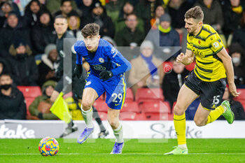 2021-12-01 - Chelsea midfielder Kai Havertz (29) followed by Watford defender Craig Cathcart (15) during the English championship Premier League football match between Watford and Chelsea on December 1, 2021 at Vicarage Road in Watford, England - WATFORD VS CHELSEA - ENGLISH PREMIER LEAGUE - SOCCER