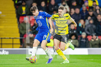 2021-12-01 - Chelsea midfielder Kai Havertz (29) battles with Watford defender Craig Cathcart (15) during the English championship Premier League football match between Watford and Chelsea on December 1, 2021 at Vicarage Road in Watford, England - WATFORD VS CHELSEA - ENGLISH PREMIER LEAGUE - SOCCER
