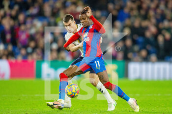 2021-12-12 - Crystal Palace forward Wilfried Zaha (11) and Seamus Coleman of Everton during the English championship Premier League football match between Crystal Palace and Everton on December 12, 2021 at Selhurst Park in London, England - CRYSTAL PALACE VS EVERTON - ENGLISH PREMIER LEAGUE - SOCCER