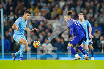 2021-12-14 - Rodri of Manchester City and Leeds United forward Tyler Roberts (11) during the English championship Premier League football match between Manchester City and Leeds United on December 14, 2021 at the Etihad Stadium in Manchester, England - MANCHESTER CITY VS LEEDS UNITED - ENGLISH PREMIER LEAGUE - SOCCER
