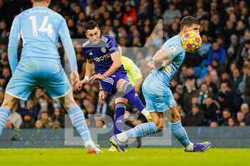 2021-12-14 - Leeds United midfielder Jack Harrison (22) takes a shot during the English championship Premier League football match between Manchester City and Leeds United on December 14, 2021 at the Etihad Stadium in Manchester, England - MANCHESTER CITY VS LEEDS UNITED - ENGLISH PREMIER LEAGUE - SOCCER