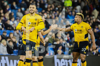 2021-12-15 - Wolverhampton Wanderers midfielder Romain Saiss (27) celebrates his goal 0-1 during the English championship Premier League football match between Brighton and Hove Albion and Wolverhampton Wanderers on December 15, 2021 at the American Express Community Stadium in Brighton and Hove, England - BRIGHTON AND HOVE ALBION VS WOLVERHAMPTON WANDERERS - ENGLISH PREMIER LEAGUE - SOCCER