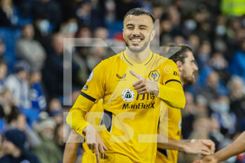 2021-12-15 - Wolverhampton Wanderers midfielder Romain Saiss (27) celebrates his goal 0-1 during the English championship Premier League football match between Brighton and Hove Albion and Wolverhampton Wanderers on December 15, 2021 at the American Express Community Stadium in Brighton and Hove, England - BRIGHTON AND HOVE ALBION VS WOLVERHAMPTON WANDERERS - ENGLISH PREMIER LEAGUE - SOCCER