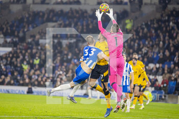 2021-12-15 - Wolverhampton Wanderers goalkeeper Jose Sa (1) saves the ball during the English championship Premier League football match between Brighton and Hove Albion and Wolverhampton Wanderers on December 15, 2021 at the American Express Community Stadium in Brighton and Hove, England - BRIGHTON AND HOVE ALBION VS WOLVERHAMPTON WANDERERS - ENGLISH PREMIER LEAGUE - SOCCER
