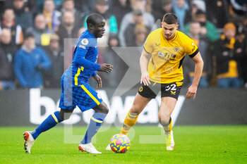 2021-12-19 - Chelsea midfielder N'Golo Kante and Leander Dendoncker of Wolverhampton during the English championship Premier League football match between Wolverhampton Wanderers and Chelsea on December 19, 2021 at Molineux in Wolverhampton, England - WOLVERHAMPTON WANDERERS VS CHELSEA - ENGLISH PREMIER LEAGUE - SOCCER