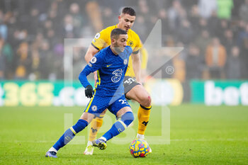 2021-12-19 - Chelsea forward Hakim Ziyech and Leander Dendoncker of Wolverhampton during the English championship Premier League football match between Wolverhampton Wanderers and Chelsea on December 19, 2021 at Molineux in Wolverhampton, England - WOLVERHAMPTON WANDERERS VS CHELSEA - ENGLISH PREMIER LEAGUE - SOCCER