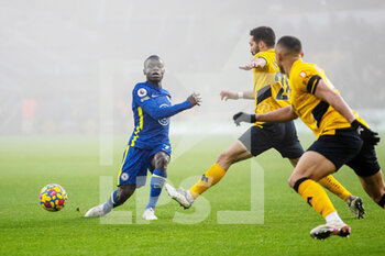 2021-12-19 - Chelsea midfielder N'Golo Kante and Joao Moutinho of Wolverhampton during the English championship Premier League football match between Wolverhampton Wanderers and Chelsea on December 19, 2021 at Molineux in Wolverhampton, England - WOLVERHAMPTON WANDERERS VS CHELSEA - ENGLISH PREMIER LEAGUE - SOCCER