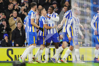 2021-12-27 - Brighton and Hove Albion midfielder Leandro Trossard (11) celebrates his goal 1-0 with Enock Mwepu during the English championship Premier League football match between Brighton and Hove Albion and Brentford on December 26, 2021 at the American Express Community Stadium in Brighton and Hove, England - BRIGHTON AND HOVE ALBION VS BRENTFORD - ENGLISH PREMIER LEAGUE - SOCCER