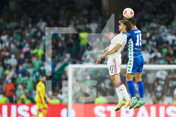 2021-09-16 - Joao Pedro Neves Jota of Celtic and Alex Moreno of Real Betis in action during the UEFA Europa League, Group G, football match played between Real Betis and Celtic FC at Benito Villamarin stadium on September 16, 2021, in Sevilla, Spain. Photo Joaquin Corchero / Spain DPPI / DPPI - REAL BETIS VS CELTIC FC - UEFA EUROPA LEAGUE - SOCCER