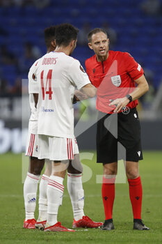 2021-09-30 - Referee Harald LECHNER and Leo DUBOIS of Lyon during the UEFA Europa League, Group A football match between Olympique Lyonnais and Brondby IF on September 30, 2021 at Groupama stadium in Decines-Charpieu near Lyon, France - OLYMPIQUE LYONNAIS VS BRONDBY IF - UEFA EUROPA LEAGUE - SOCCER