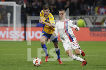 2021-09-30 - Maxence CAQUERET of Lyon and Morten FRENDRUP of Brondby during the UEFA Europa League, Group A football match between Olympique Lyonnais and Brondby IF on September 30, 2021 at Groupama stadium in Decines-Charpieu near Lyon, France - OLYMPIQUE LYONNAIS VS BRONDBY IF - UEFA EUROPA LEAGUE - SOCCER
