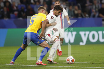 2021-09-30 - Lucas PAQUETA of Lyon and Andreas MAXSO of Brondby during the UEFA Europa League, Group A football match between Olympique Lyonnais and Brondby IF on September 30, 2021 at Groupama stadium in Decines-Charpieu near Lyon, France - OLYMPIQUE LYONNAIS VS BRONDBY IF - UEFA EUROPA LEAGUE - SOCCER