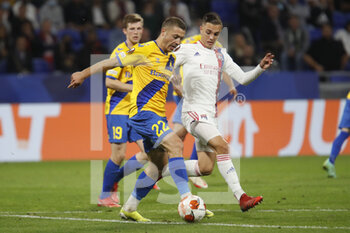 2021-09-30 - Josip RADOSEVIC of Brondby and Maxence CAQUERET of Lyon during the UEFA Europa League, Group A football match between Olympique Lyonnais and Brondby IF on September 30, 2021 at Groupama stadium in Decines-Charpieu near Lyon, France - OLYMPIQUE LYONNAIS VS BRONDBY IF - UEFA EUROPA LEAGUE - SOCCER