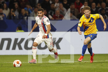 2021-09-30 - Houssem AOUAR of Lyon and Christian CAPPIS of Brondby during the UEFA Europa League, Group A football match between Olympique Lyonnais and Brondby IF on September 30, 2021 at Groupama stadium in Decines-Charpieu near Lyon, France - OLYMPIQUE LYONNAIS VS BRONDBY IF - UEFA EUROPA LEAGUE - SOCCER