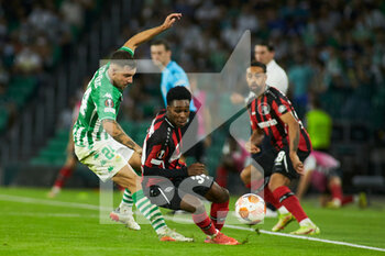 2021-10-21 - Aitor Ruibal of Real Betis and Amine Adli of Bayer 04 Leverkusen during the UEFA Europa League, Group G football match between Real Betis and Bayer 04 Leverkusen on October 21, 2021 at Benito Villamarin stadium in Sevilla, Spain - REAL BETIS VS BAYER 04 LEVERKUSEN - UEFA EUROPA LEAGUE - SOCCER
