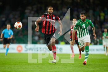 2021-10-21 - Jonathan Tah of Bayer 04 Leverkusen and William Jose of Real Betis during the UEFA Europa League, Group G football match between Real Betis and Bayer 04 Leverkusen on October 21, 2021 at Benito Villamarin stadium in Sevilla, Spain - REAL BETIS VS BAYER 04 LEVERKUSEN - UEFA EUROPA LEAGUE - SOCCER