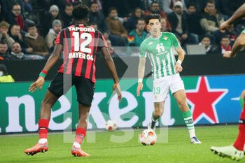 2021-11-04 - Edmond Tapsoba of Bayer Leverkusen and Hector Bellerin of Real Betis Balompie during the UEFA Europa League, Group G football match between Bayer Leverkusen and Real Betis Balompie on November 4, 2021 at BayArena in Leverkusen, Germany - BAYER LEVERKUSEN VS REAL BETIS BALOMPIE - UEFA EUROPA LEAGUE - SOCCER