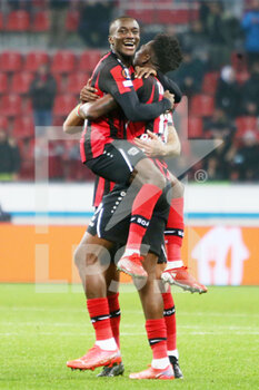 2021-11-04 - Moussa Diaby of Bayer Leverkusen celebrates after scoring a goal with Edmond Tapsoba during the UEFA Europa League, Group G football match between Bayer Leverkusen and Real Betis Balompie on November 4, 2021 at BayArena in Leverkusen, Germany - BAYER LEVERKUSEN VS REAL BETIS BALOMPIE - UEFA EUROPA LEAGUE - SOCCER