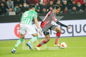 2021-11-04 - Amine Adli of Bayer Leverkusen and Marc Bartra of Real Betis Balompie during the UEFA Europa League, Group G football match between Bayer Leverkusen and Real Betis Balompie on November 4, 2021 at BayArena in Leverkusen, Germany - BAYER LEVERKUSEN VS REAL BETIS BALOMPIE - UEFA EUROPA LEAGUE - SOCCER