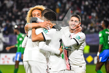 2021-12-19 - Kylian MBAPPE of PSG celebrate his goal with Marco VERRATTI of PSG and Xavi SIMONS of PSG during the French Cup round of 32 football match between Feignies Aulnoy and Paris Saint-Germain (PSG) on December 19, 2021 at Stade du Hainaut in Valenciennes, France - FEIGNIES AULNOY VS PARIS SAINT-GERMAIN (PSG) - FRENCH CUP - SOCCER
