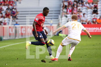 2021-08-14 - Duel WEAH 20 LOSC and Melvin BARD 26 NICE during the French championship Ligue 1 football match between LOSC Lille and OGC Nice on August 14, 2021 at Pierre Mauroy stadium in Villeneuve-d'Ascq near Lille, France - Photo Laurent Sanson / LS Medianord / DPPI - LOSC LILLE VS OGC NICE - FRENCH LIGUE 1 - SOCCER