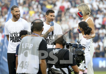 2021-08-14 - Sergio Ramos, Lionel Messi, presenter Anne-Laure Bonnet during the new recruits of PSG presentation ahead of the French championship Ligue 1 football match between Paris Saint-Germain and RC Strasbourg on August 14, 2021 at Parc des Princes stadium in Paris, France - Photo Jean Catuffe / DPPI - PARIS SAINT-GERMAIN VS RC STRASBOURG - FRENCH LIGUE 1 - SOCCER