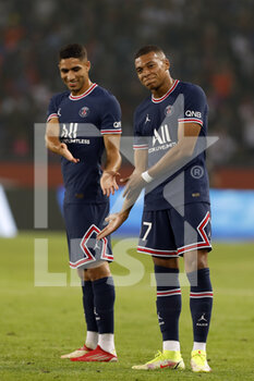 2021-08-14 - Paris Saint-Germain's French forward Kylian Mbappe and Achraf Hakimi during the French championship Ligue 1 football match between Paris Saint-Germain and RC Strasbourg on August 14, 2021 at Parc des Princes stadium in Paris, France - Photo Mehdi Taamallah / DPPI - PARIS SAINT-GERMAIN VS RC STRASBOURG - FRENCH LIGUE 1 - SOCCER