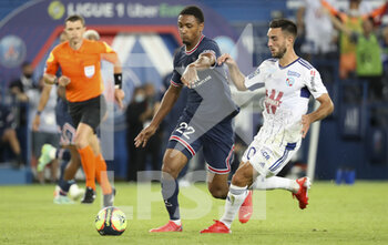 2021-08-14 - Abdou Diallo of PSG, Adrien Thomasson of Strasbourg during the French championship Ligue 1 football match between Paris Saint-Germain and RC Strasbourg on August 14, 2021 at Parc des Princes stadium in Paris, France - Photo Jean Catuffe / DPPI - PARIS SAINT-GERMAIN VS RC STRASBOURG - FRENCH LIGUE 1 - SOCCER