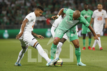 2021-08-21 - Wahbi KHAZRI of Saint Etienne and Reinildo MANDAVA of Lille during the French championship Ligue 1 football match between AS Saint-Etienne and LOSC Lille on August 21, 2021 at Geoffroy-Guichard stadium in Saint-Etienne, France - Photo Romain Biard / Isports / DPPI - AS SAINT-ETIENNE (ASSE) VS LILLE OSC (LOSC) - FRENCH LIGUE 1 - SOCCER