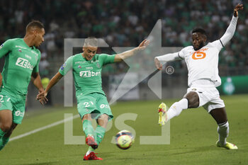 2021-08-21 - Romain HAMOUMA of Saint Etienne and Jonathan BAMBA of Lille during the French championship Ligue 1 football match between AS Saint-Etienne and LOSC Lille on August 21, 2021 at Geoffroy-Guichard stadium in Saint-Etienne, France - Photo Romain Biard / Isports / DPPI - AS SAINT-ETIENNE (ASSE) VS LILLE OSC (LOSC) - FRENCH LIGUE 1 - SOCCER