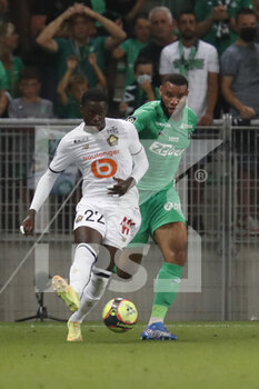 2021-08-21 - Timothy WEAH of Lille and Mahdi CAMARA of Saint Etienne during the French championship Ligue 1 football match between AS Saint-Etienne and LOSC Lille on August 21, 2021 at Geoffroy-Guichard stadium in Saint-Etienne, France - Photo Romain Biard / Isports / DPPI - AS SAINT-ETIENNE (ASSE) VS LILLE OSC (LOSC) - FRENCH LIGUE 1 - SOCCER