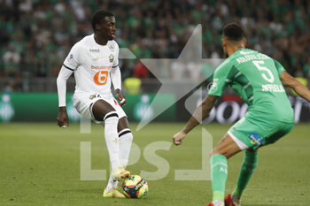2021-08-21 - Timothy WEAH of Lille and Thimothee KOLODZIEJCZAK of Saint Etienne during the French championship Ligue 1 football match between AS Saint-Etienne and LOSC Lille on August 21, 2021 at Geoffroy-Guichard stadium in Saint-Etienne, France - Photo Romain Biard / Isports / DPPI - AS SAINT-ETIENNE (ASSE) VS LILLE OSC (LOSC) - FRENCH LIGUE 1 - SOCCER