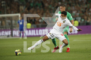 2021-08-21 - Benjamin ANDRE of Lille and Romain HAMOUMA of Saint Etienne during the French championship Ligue 1 football match between AS Saint-Etienne and LOSC Lille on August 21, 2021 at Geoffroy-Guichard stadium in Saint-Etienne, France - Photo Romain Biard / Isports / DPPI - AS SAINT-ETIENNE (ASSE) VS LILLE OSC (LOSC) - FRENCH LIGUE 1 - SOCCER