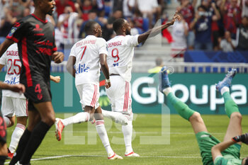 2021-08-22 - Moussa DEMBELE of Lyon goal and Karl TOKO EKAMBI of Lyon during the French championship Ligue 1 football match between Olympique Lyonnais and Clermont Foot 63 on August 22, 2021 at Groupama stadium in Decines-Charpieu near Lyon, France - Photo Romain Biard / Isports / DPPI - OLYMPIQUE LYONNAIS VS CLERMONT FOOT 63 - FRENCH LIGUE 1 - SOCCER
