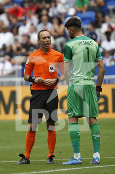 2021-08-22 - Referee Thomas LEONARD and Arthur DESMAR of Clermont during the French championship Ligue 1 football match between Olympique Lyonnais and Clermont Foot 63 on August 22, 2021 at Groupama stadium in Decines-Charpieu near Lyon, France - Photo Romain Biard / Isports / DPPI - OLYMPIQUE LYONNAIS VS CLERMONT FOOT 63 - FRENCH LIGUE 1 - SOCCER